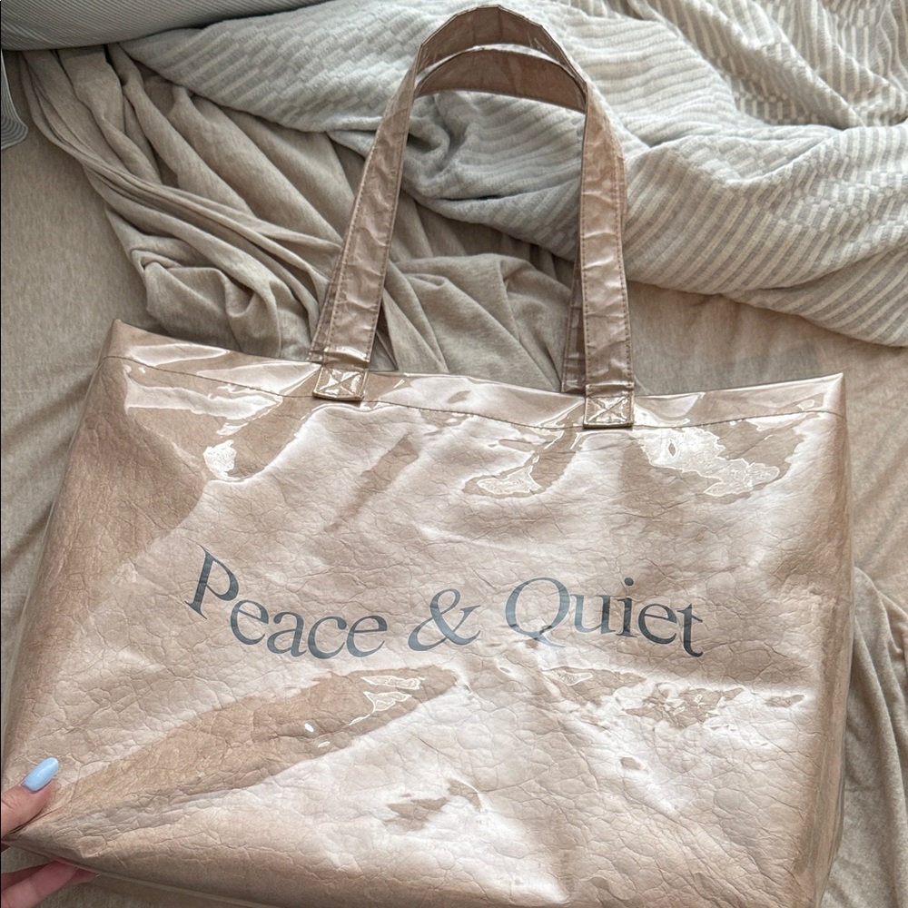 Peace & Quiet Shiny Tote Bag from revolve
